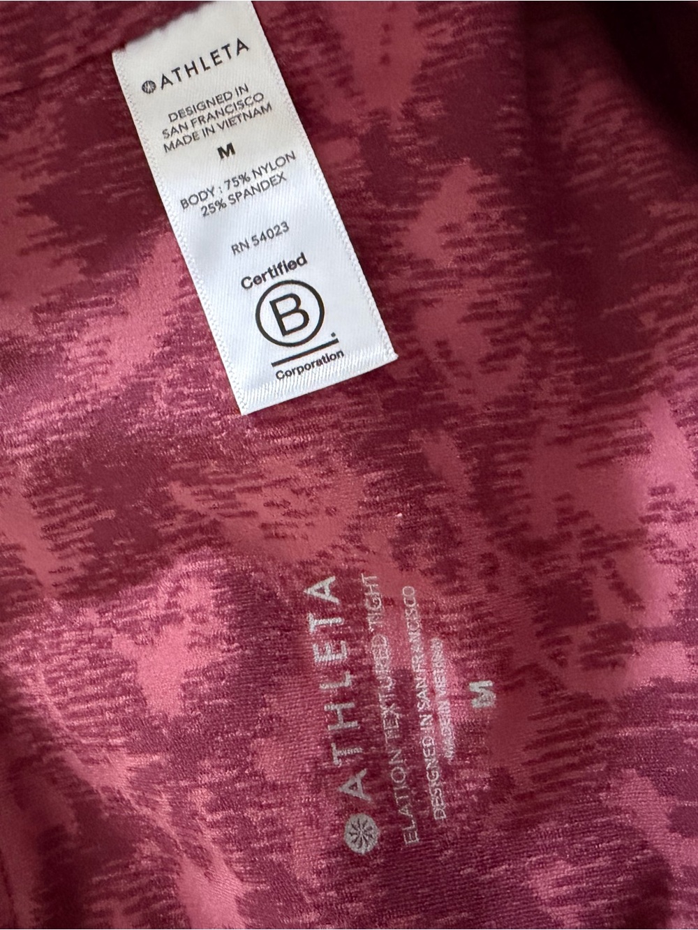 Athleta Elation cranberry floral leggings-size M